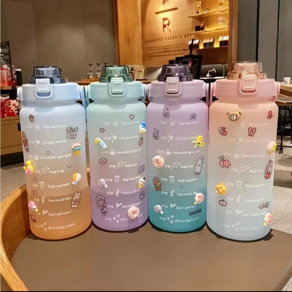 Water Bottle With Straw And A Cute Motivational Design